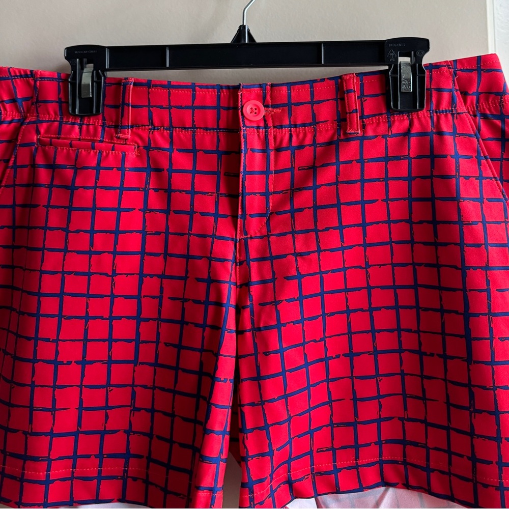 Under Armour performance shorts size 12. NWOT